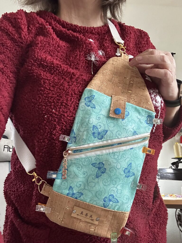 cross-body bag with outside zipper